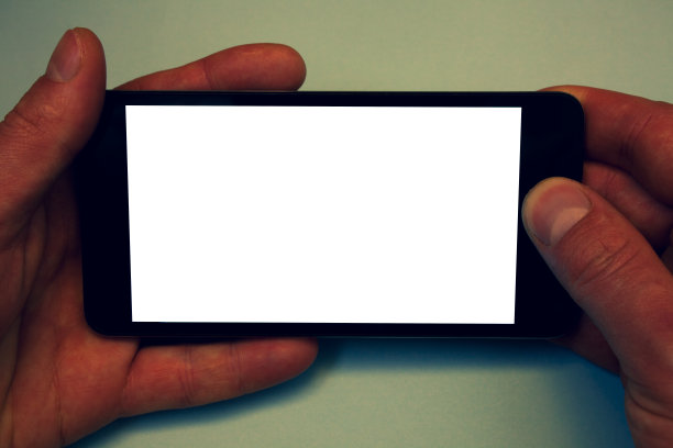 设计经营理念空拷贝空间现代抽象背景男子手持手机白屏短信应用意向图片下载