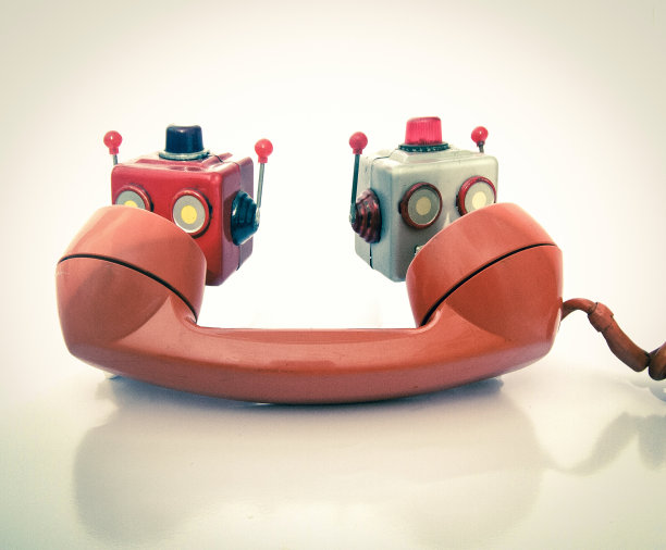 老式电话和聊天机器人头调图片下载