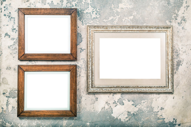 照片或画框空白挂在复古的老垃圾纹理混凝土墙背景。复古旧风格滤镜照片图片下载