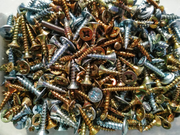 铁工银青铜铁不锈钢自攻螺丝背景纹理微距照片图片下载