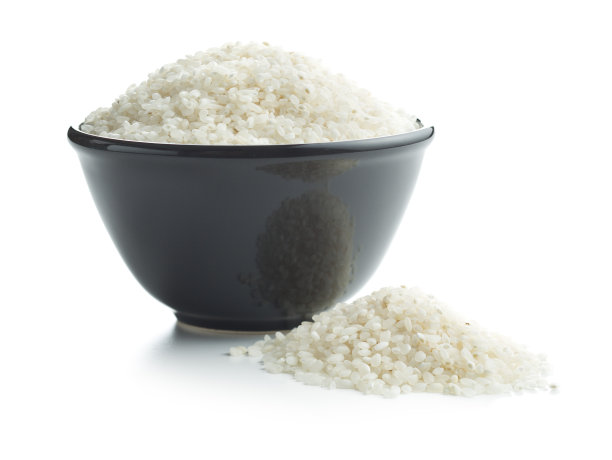 白色寿司米饭在碗孤立在白色的背景。图片下载