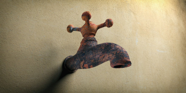 生锈的金属水龙头，米黄色的墙壁背景。三维演示图片下载