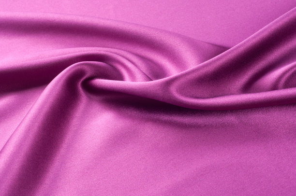 织物的纹理背景。红色的绸缎。一块暗红色的舞台幕布。抽象的背景豪华的织物或液体波浪或波浪褶皱的垃圾丝绸缎子纹理的天鹅绒材料或豪华图片下载