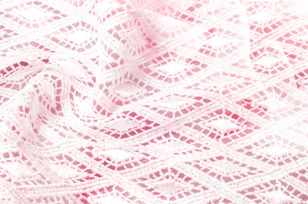 纹理背景图案。花边的白色织物。手蕾丝上的白色背景。白色饰品，婚纱面料上的刺绣，明信片，照片墙纸，海报，图片下载