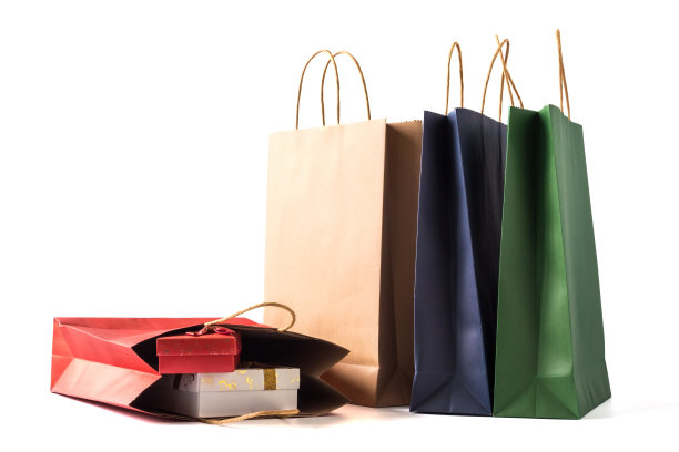 彩色的购物纸袋与礼品盒在白色的背景图片下载