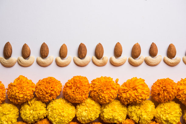 排灯节的概念使用Cachew/Kaju和Almond/Badam aoing与油灯和花图片下载