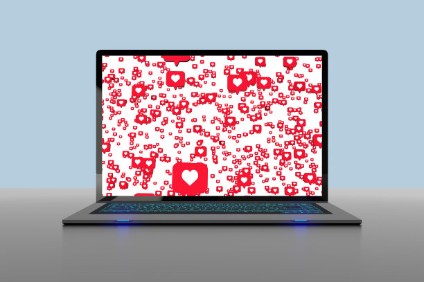 笔记本电脑和屏幕上的社交媒体符号图片下载