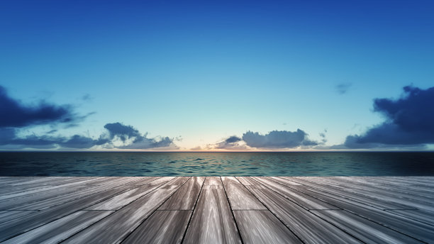 木制甲板与日出的海上风景图片下载