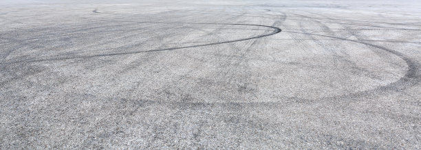 赛道上的沥青路面背景图片下载