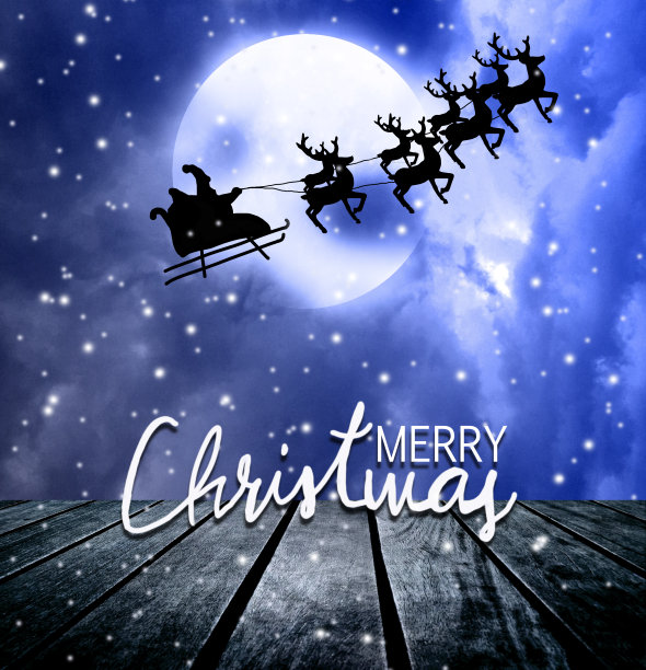 圣诞老人驾着驯鹿雪橇的剪影图片下载