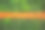 绿色草坪上的鲜橙色软管(两根线)。从以上观点。抽象的园艺背景。图片下载