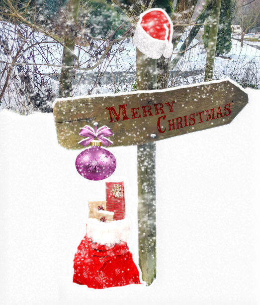 圣诞快乐的木制指示板上有一层厚厚的雪和下雪的天气图片下载