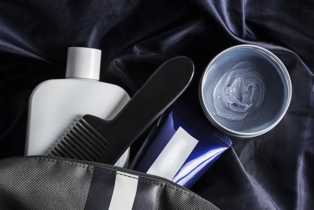 男士身体保健旅行包上的深蓝色面料背景图片下载