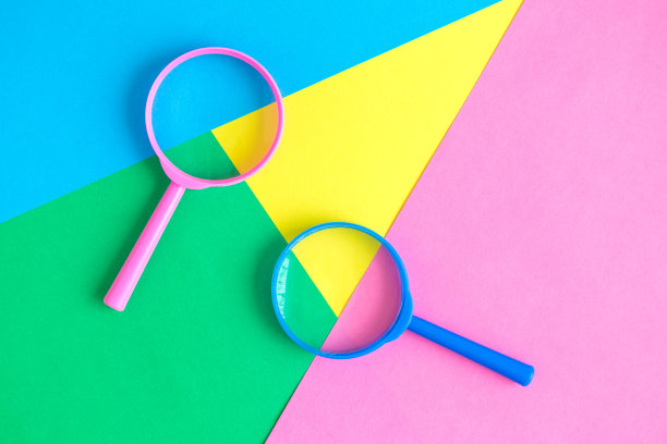 粉彩放大镜背景搜索简约的概念。图片下载