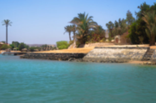 美丽的海岸线和红海上的房子和酒店。埃及的旅游区。赫尔格达及其传统。设计素材照片图片下载