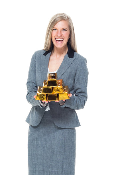 拿着金条的女商人图片下载