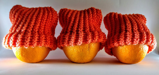 橘子和帽子。图片下载