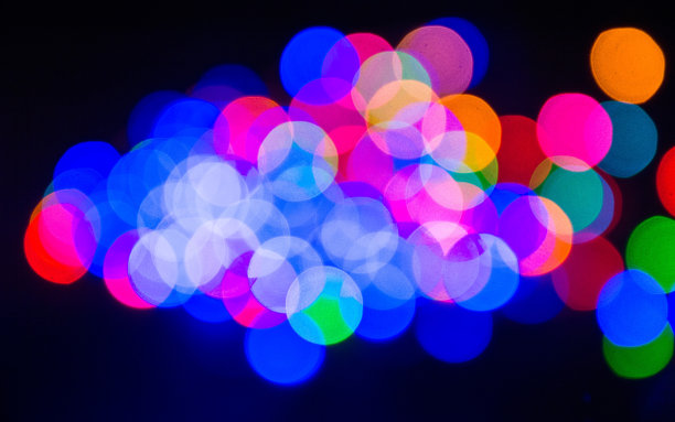 蓝色的散景抽象背景。图片下载