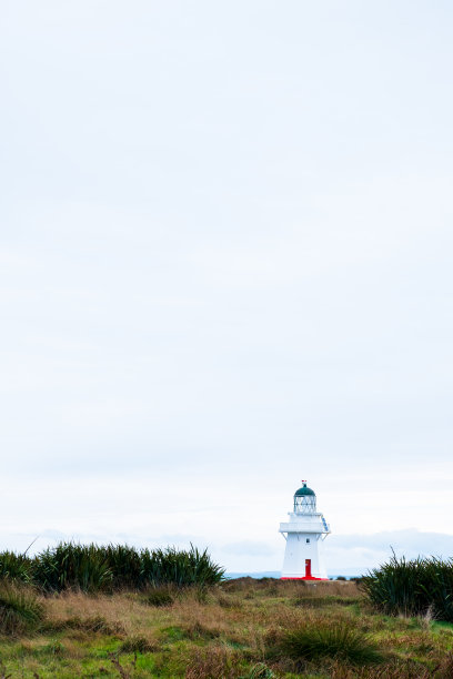 怀帕帕角，灯塔，大海和多云。图片下载