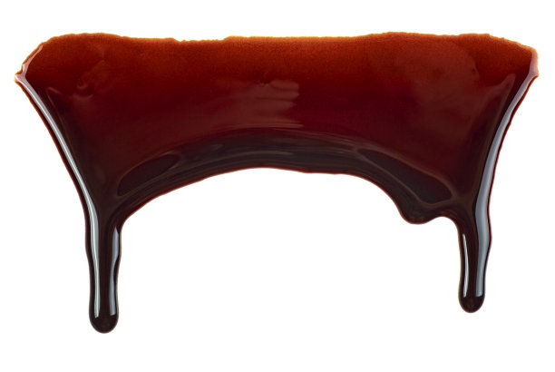 融化的巧克力滴孤立在白色背景图片下载