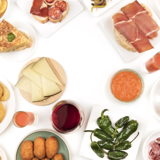西班牙美食的照片，从上往下拍。在白色背景上形成一个框架，并为文本留出位置图片下载