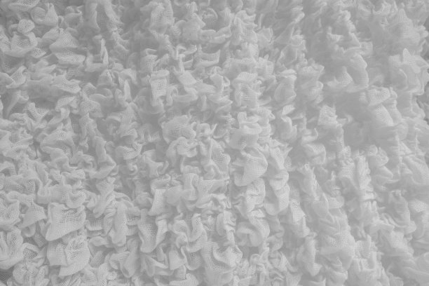 非常精细的纤维合成织物纹理背景。图片下载