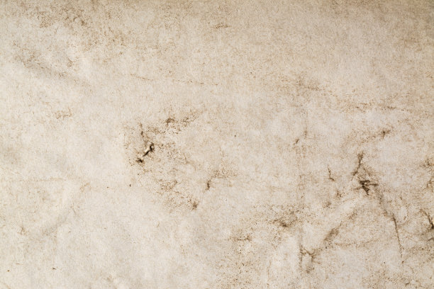 老式纸张的照片质感，有磨损、裂缝和洒出的咖啡滴。图片下载