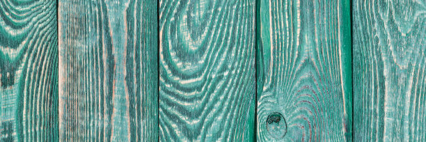 背景为木质纹理板，其余为绿色油漆。垂直的。缩小。图片下载