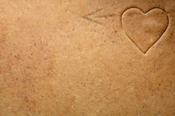 生姜面团底色为棕色，右下角有心形和箭头图片下载