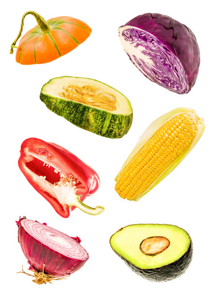 孤立的蔬菜片。落切洋葱、南瓜、玉米、牛油果、甜椒、红卷心菜图片下载