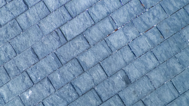 灰色的人行道上的背景。图片下载