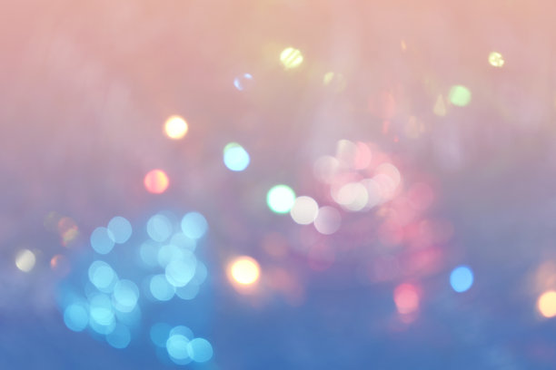 散景灯的背景。在蓝色和粉色背景上散焦的光圈。照片可用于网页设计，表面纹理，壁纸，印刷产品等。图片下载