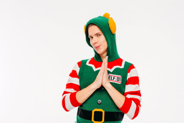 迷人的年轻男子少年精灵服装在白色背景图片下载