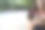 年轻女子使用带有社交媒体符号的智能手机图片下载