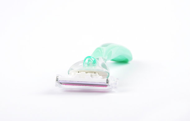 剃须刀在白色背景图片下载