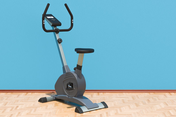 健身自行车在房间的木地板上，3D渲染图片下载