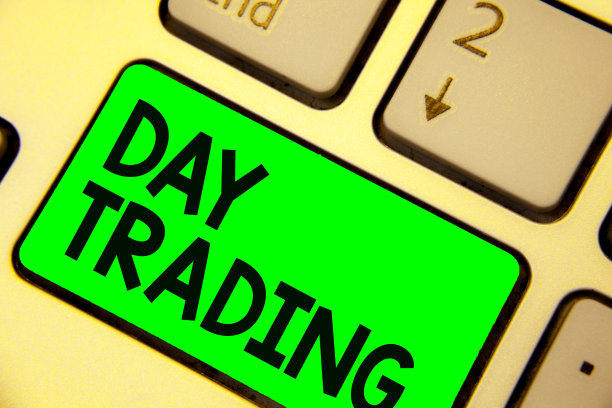 显示日内交易的概念性手写。商业图片展示证券具体买卖金融工具键盘绿色键计算机计算反映文件。图片下载