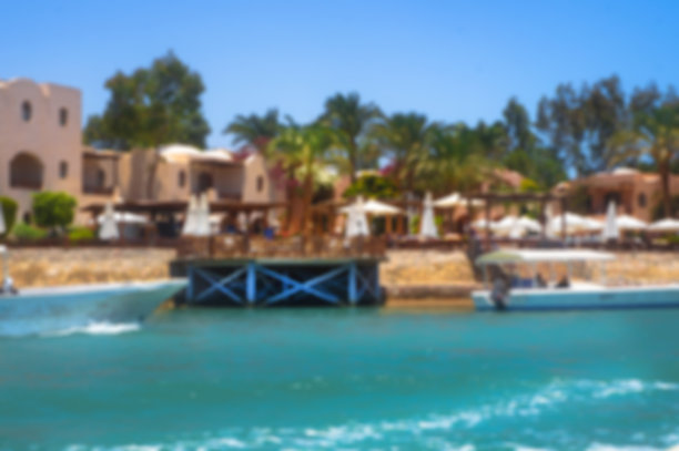 美丽的海岸线和红海上的房子和酒店。埃及的旅游区。赫尔格达及其传统。设计素材照片图片下载