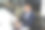 年轻的商人微笑着坐在会议室里图片下载