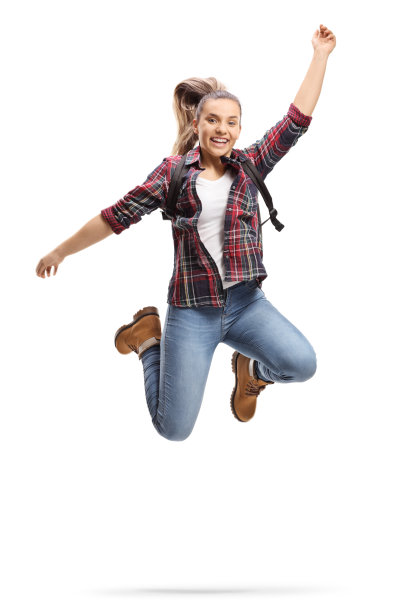 快乐的女学生跳跃图片下载