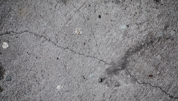 混凝土结构。沥青的背景。路面。道路上的沥青和石头的纹理。图片下载