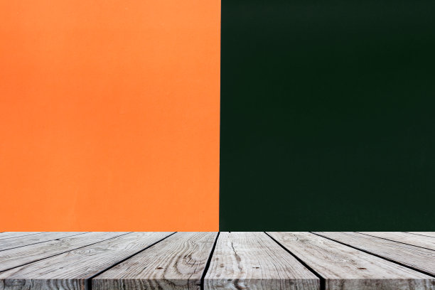 橙色和黑色的木制桌面作为万圣节的背景图片下载