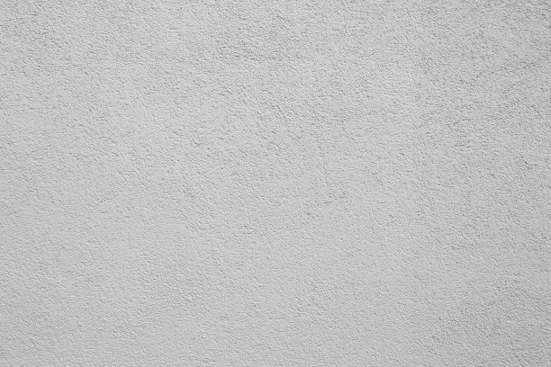 白色和灰色墙壁特写纹理照片。灰泥背景与细颗粒图片下载