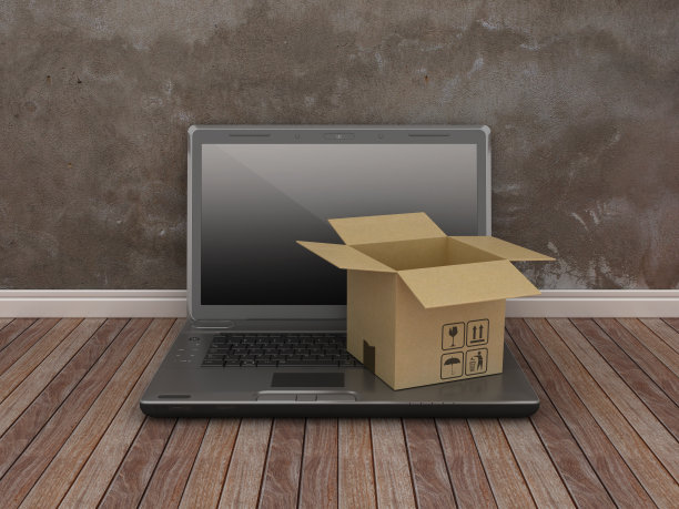 电脑笔记本电脑与纸板箱- 3D渲染图片下载