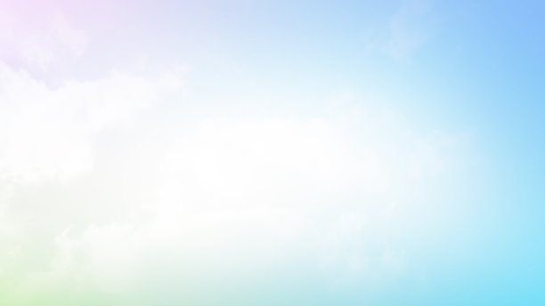 柔和的渐变色粉彩云朵，甜美色调的抽象天空背景素材图片