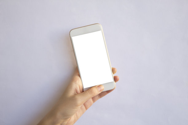 手持手机与孤立的背景图片下载