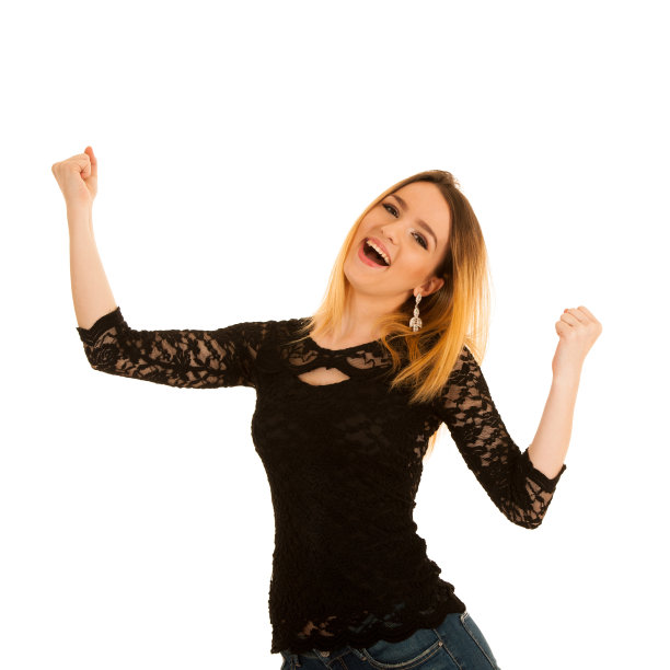 可爱的年轻女子示意胜利与双手孤立在白色的背景图片下载