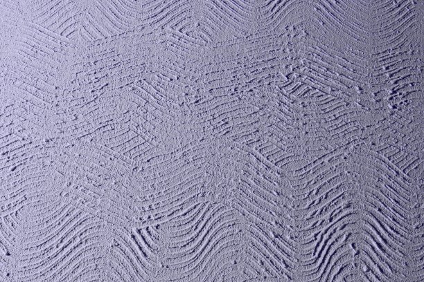 蓝色凌乱的弯曲石膏在墙上纹理-相当抽象的照片背景图片下载