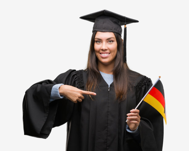 年轻的西班牙裔妇女穿着毕业制服举着德国国旗与惊讶的脸指向自己图片下载