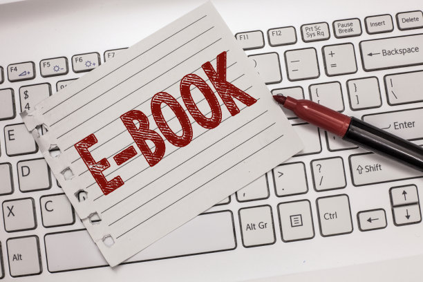 文本标志显示电子书。概念照片电子版印刷书籍，可阅读电脑或平板电脑图片下载